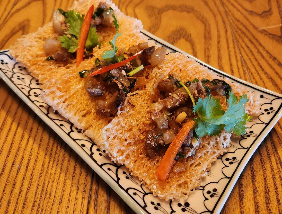 Golden crisp bites on a platter at Saigon Sister